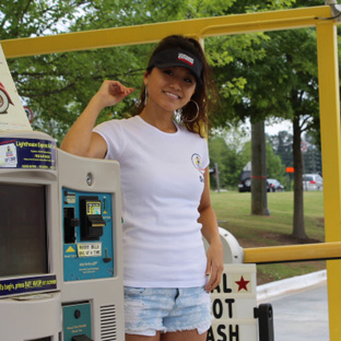 Sophia Lighthouse Car Wash girl greeting guests